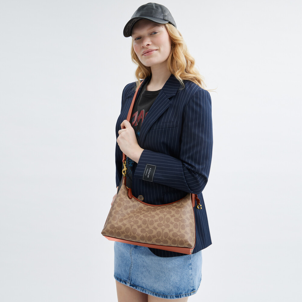 Coach Juliet Shoulder Bag In Signature Canvas - Light/Pastel Brown
