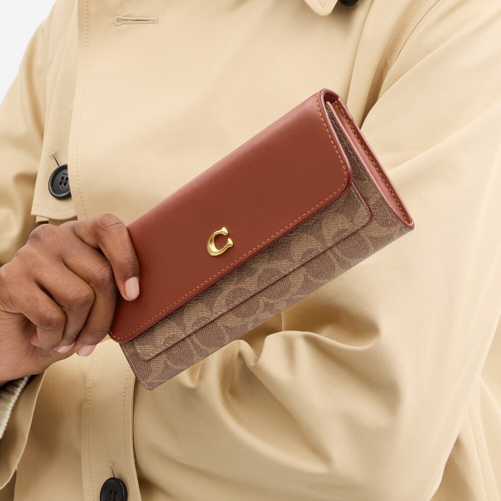 Coach Mila Long Flap Wallet In Signature Canvas - Light/Pastel Brown
