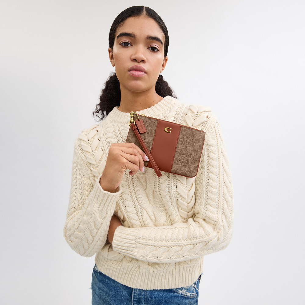 Coach Small Wristlet In Signature Canvas - Light/Pastel Brown