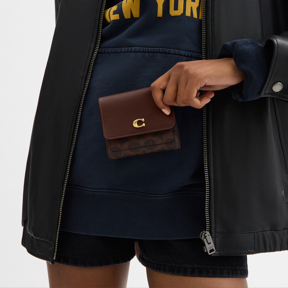 Coach Mila Small Flap Wallet In Signature Canvas - DARK BROWN