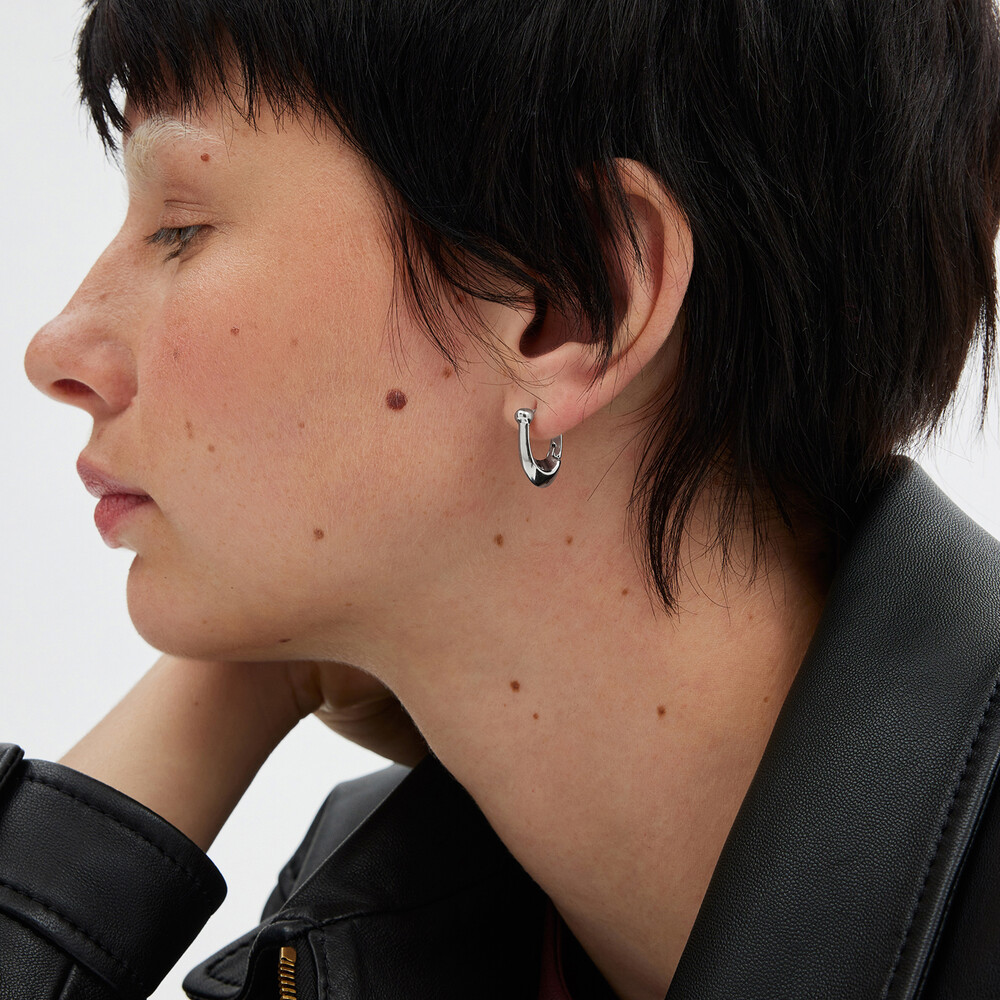 Coach Signature C Huggie Earrings In Metal - Silver